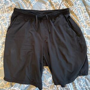 Lululemon Black 9” Pace Breaker Linerless Large